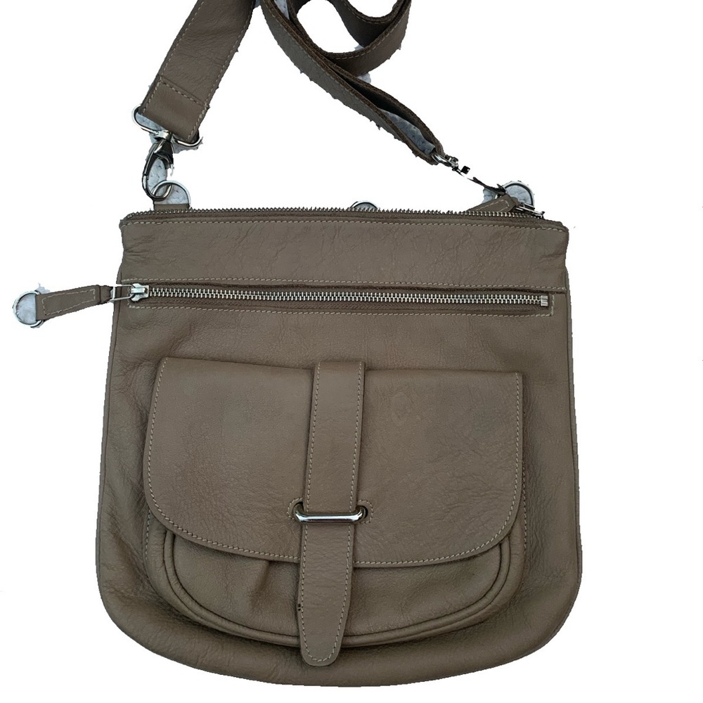 Roots crossbody bag with long straps.
